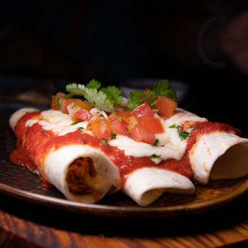 Delicious Enchilladas on Brown Plate